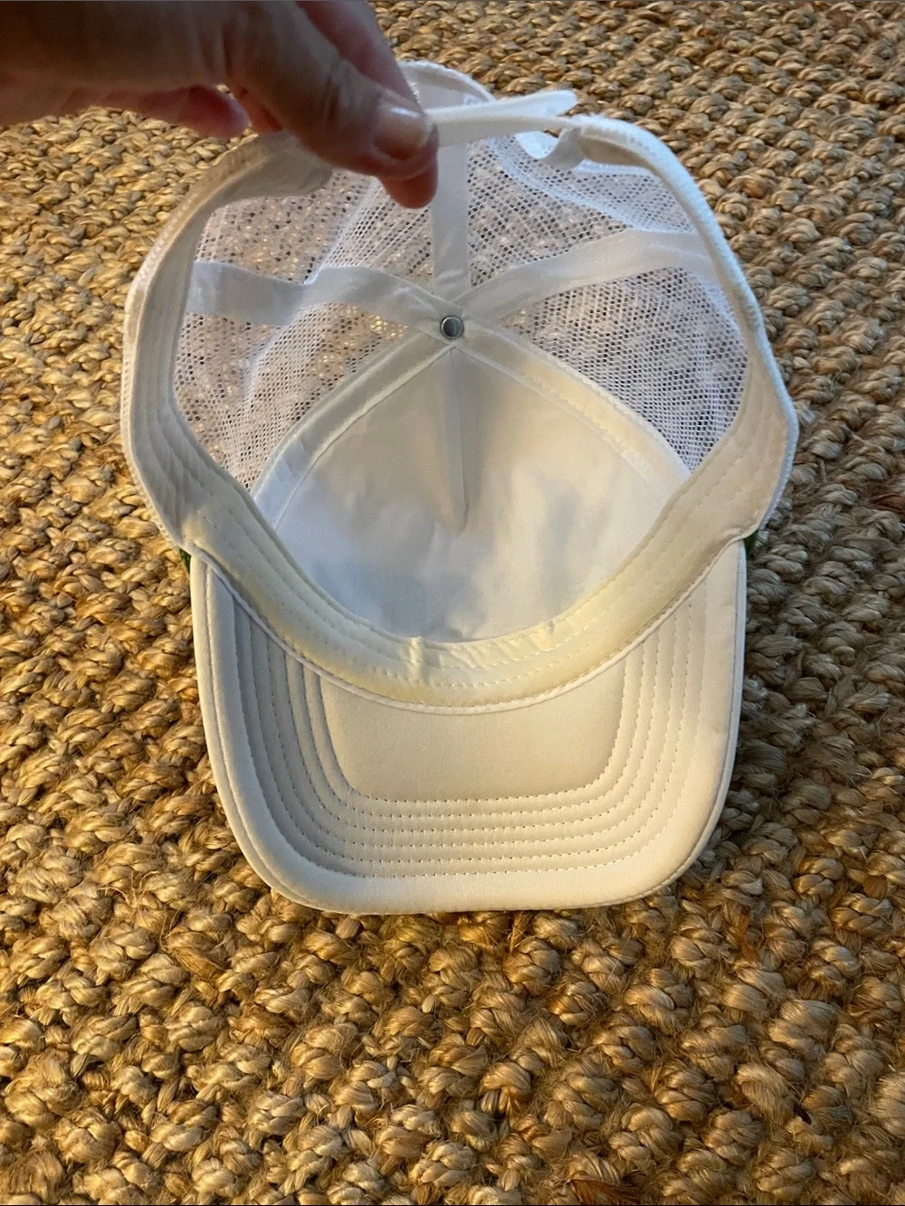 White Trucker Hat with Green Script Accent